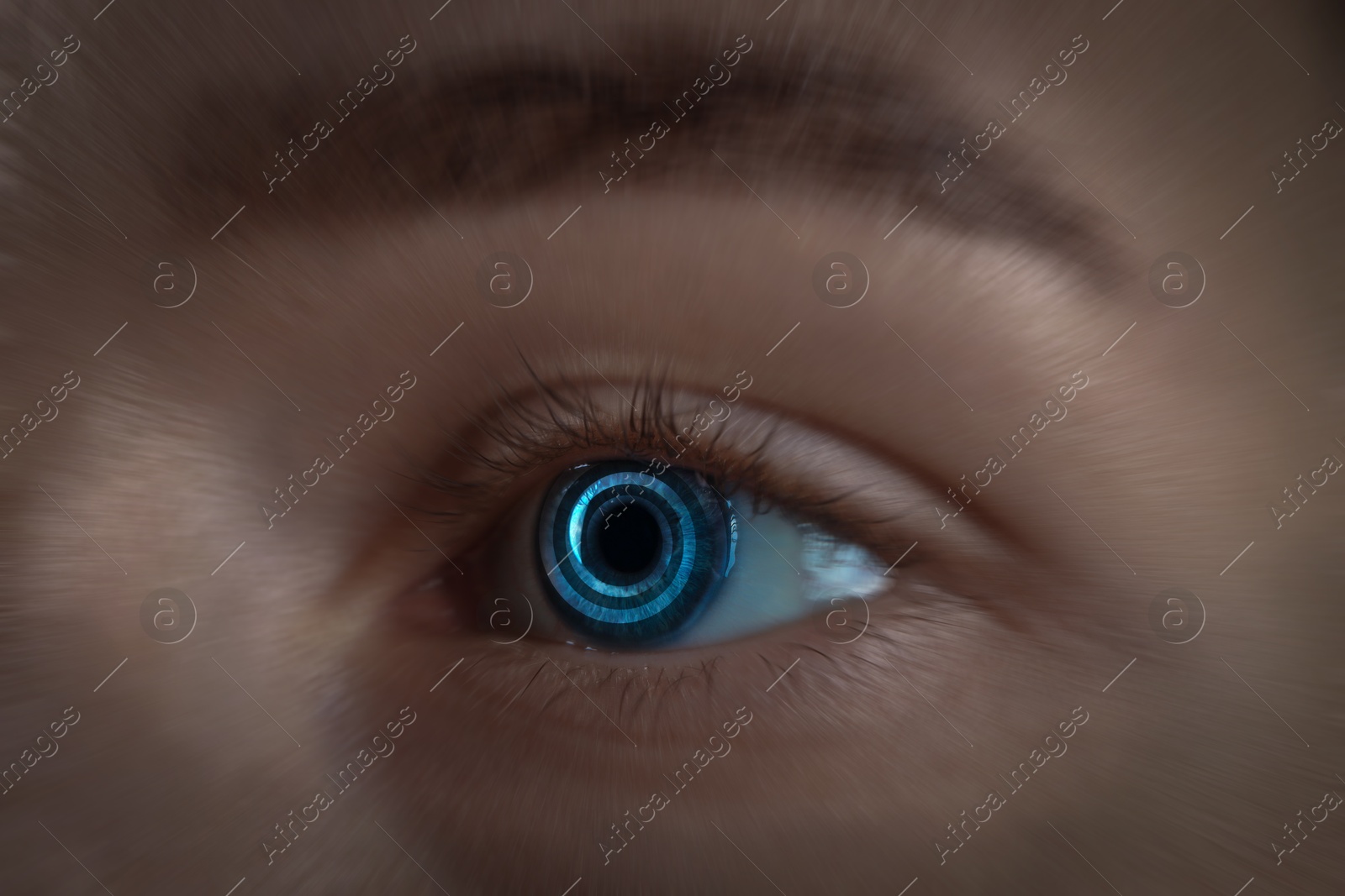 Image of Hypnosis. Hypnotic spiral in woman's eye, closeup