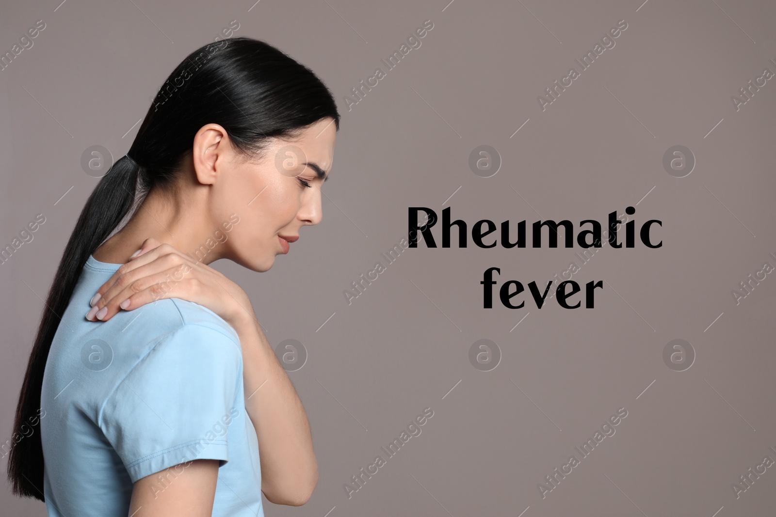 Image of Rheumatism. Woman suffering from pain in shoulder on grey background