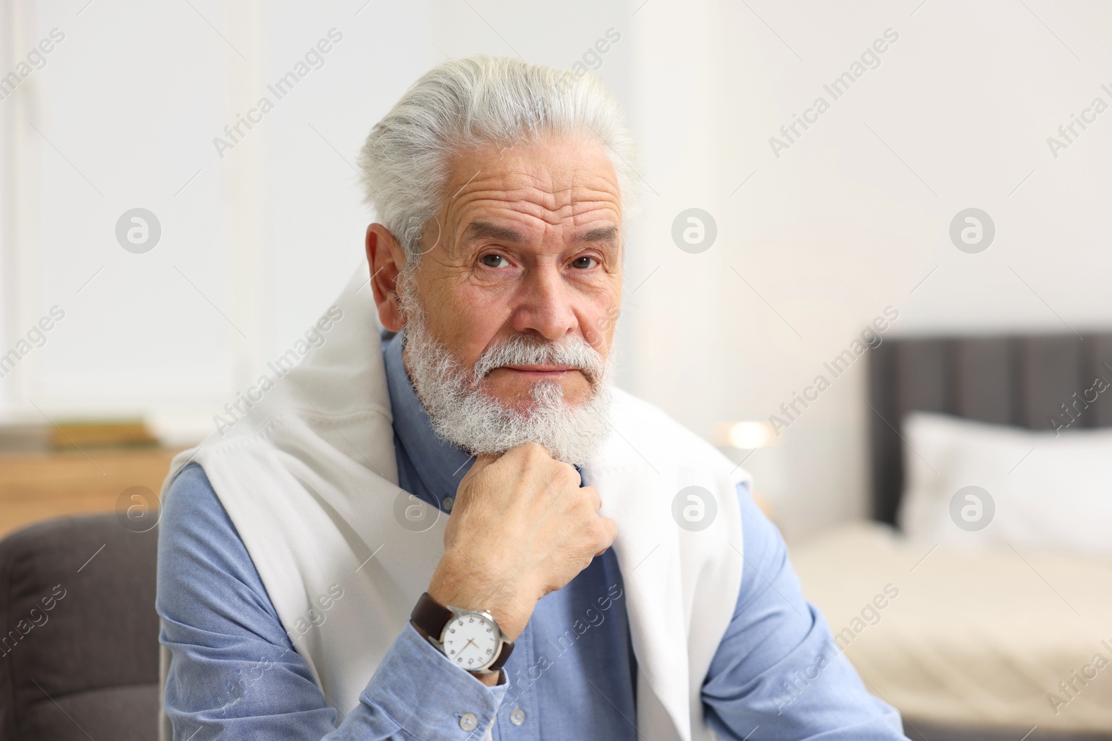 Photo of Portrait of handsome bearded man at home