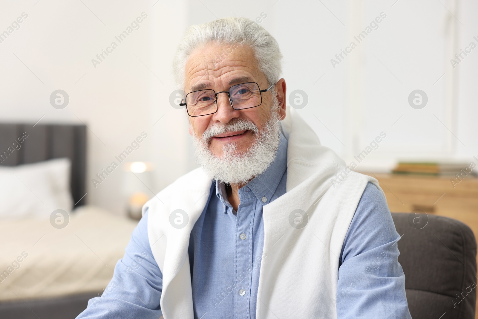 Photo of Portrait of handsome bearded man at home