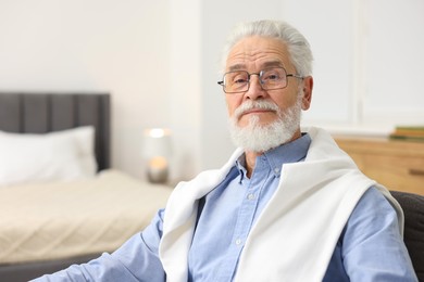 Photo of Portrait of handsome bearded man at home