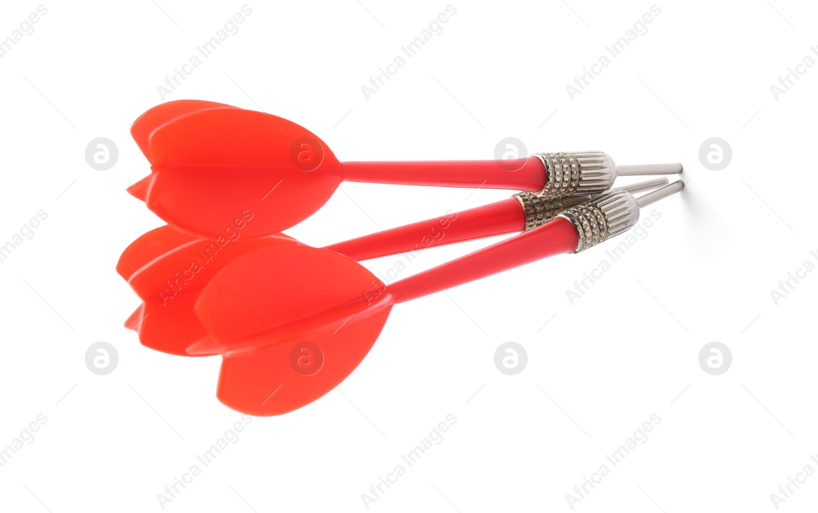 Photo of Red dart arrows isolated on white. Sports equipment