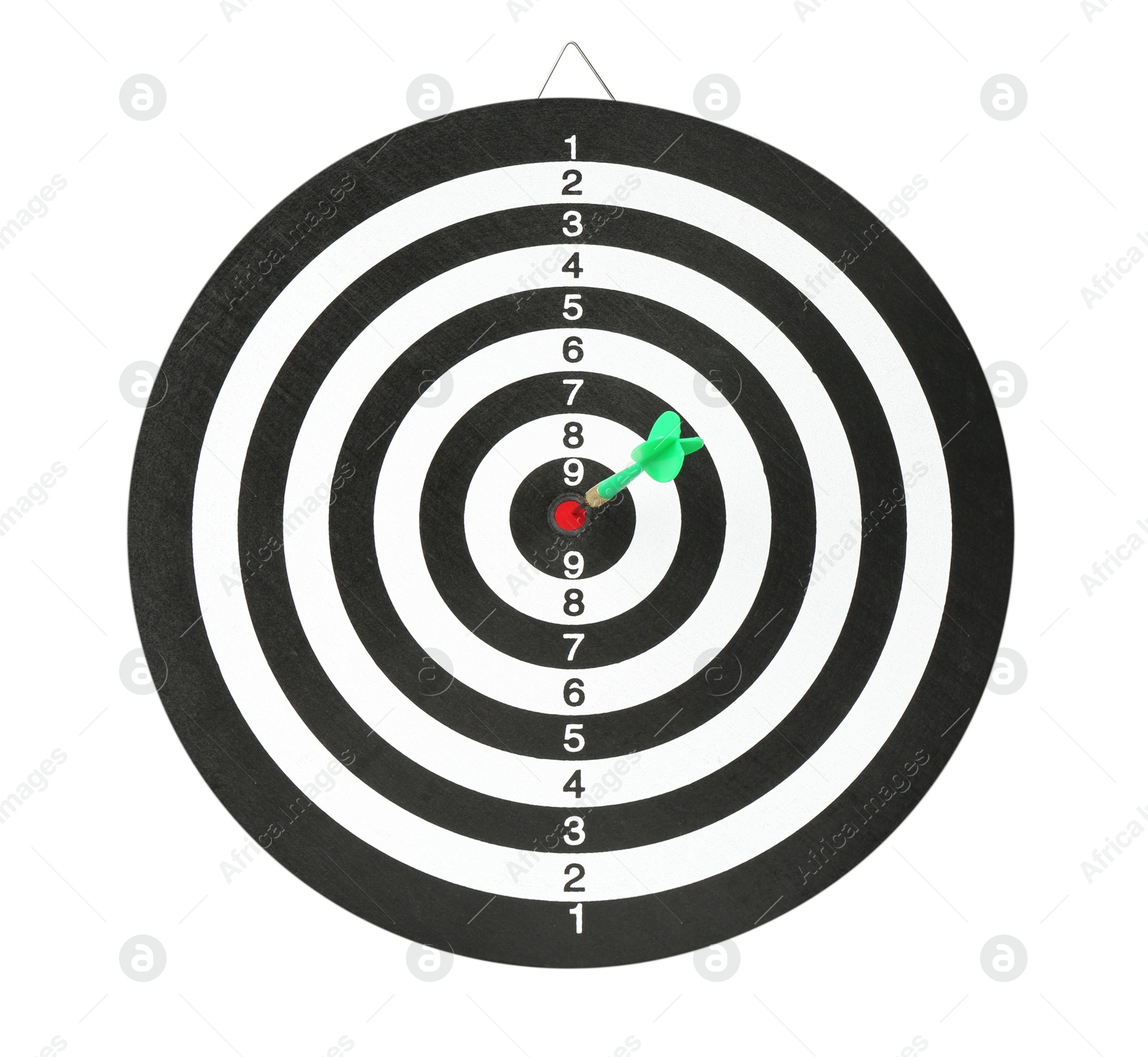 Photo of Dart board with green arrow hitting target isolated on white