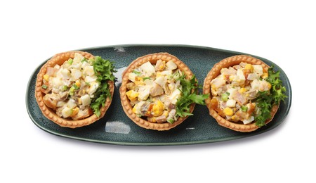 Tartlets with delicious filling isolated on white, top view