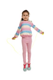 Photo of Cute little girl with jump rope on white background