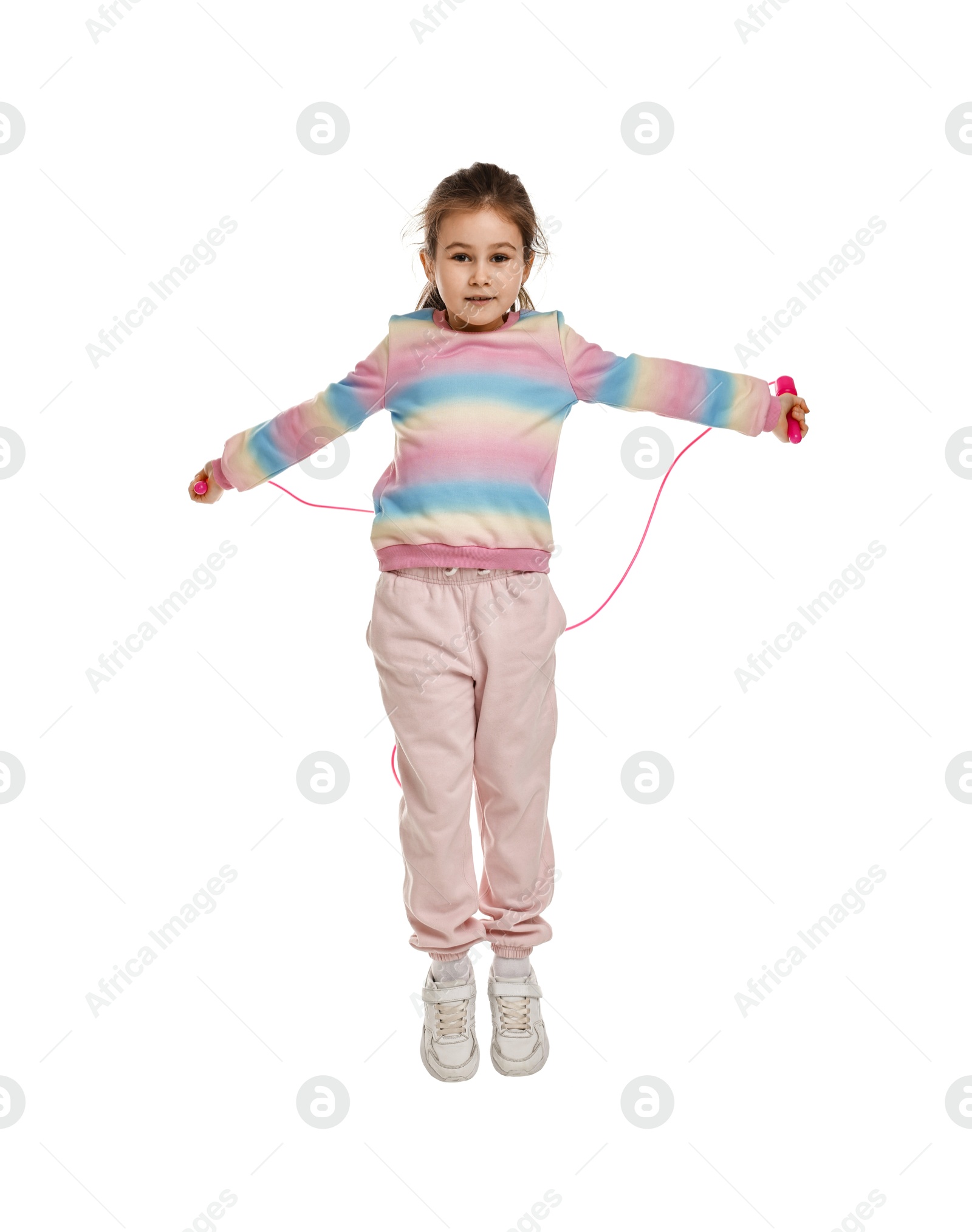 Photo of Cute little girl with jump rope on white background