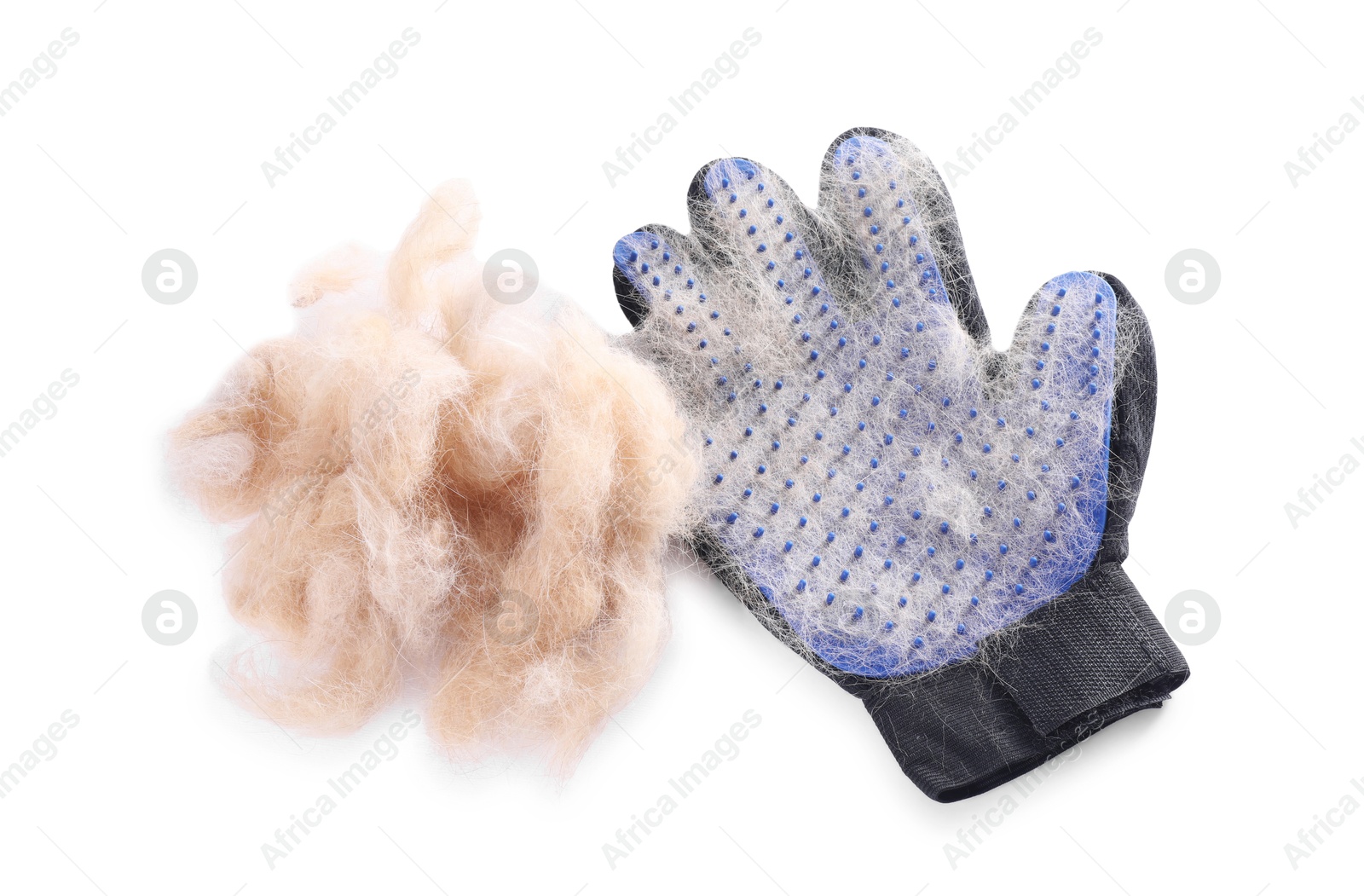 Photo of Grooming glove and pile of pet's hair isolated on white, top view