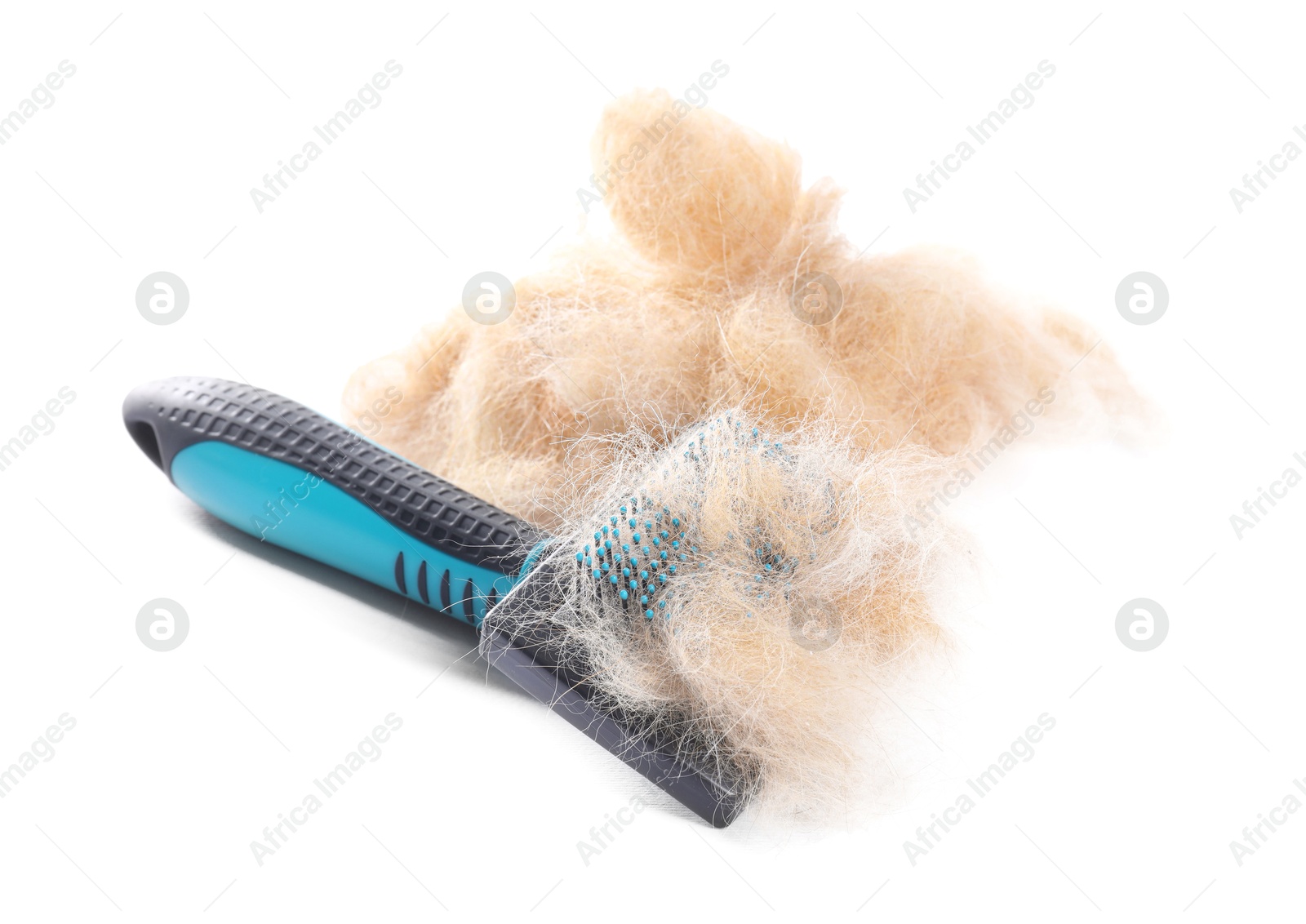 Photo of Grooming brush and pile of pet's hair isolated on white