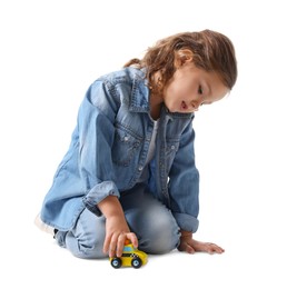 Photo of Little girl playing with toy car on white background