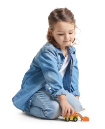 Photo of Little girl playing with toy car on white background