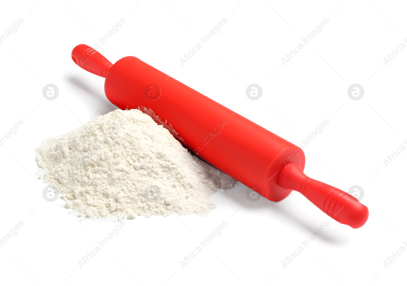 Photo of Red rolling pin and flour isolated on white