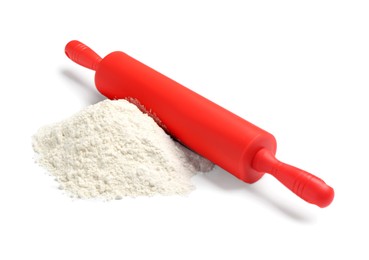 Photo of Red rolling pin and flour isolated on white