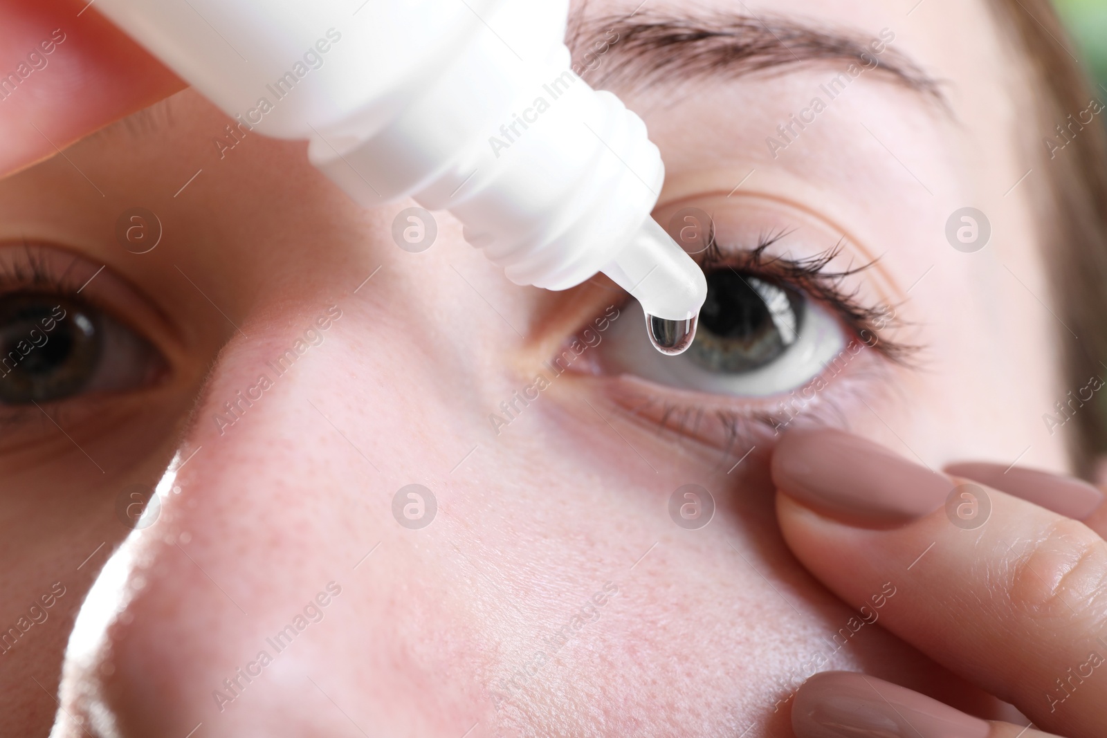 Photo of Allergy treatment. Woman dripping medical drops into eyes, closeup