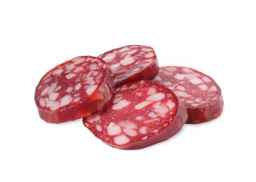 Photo of Pieces of delicious dry cured sausage isolated on white