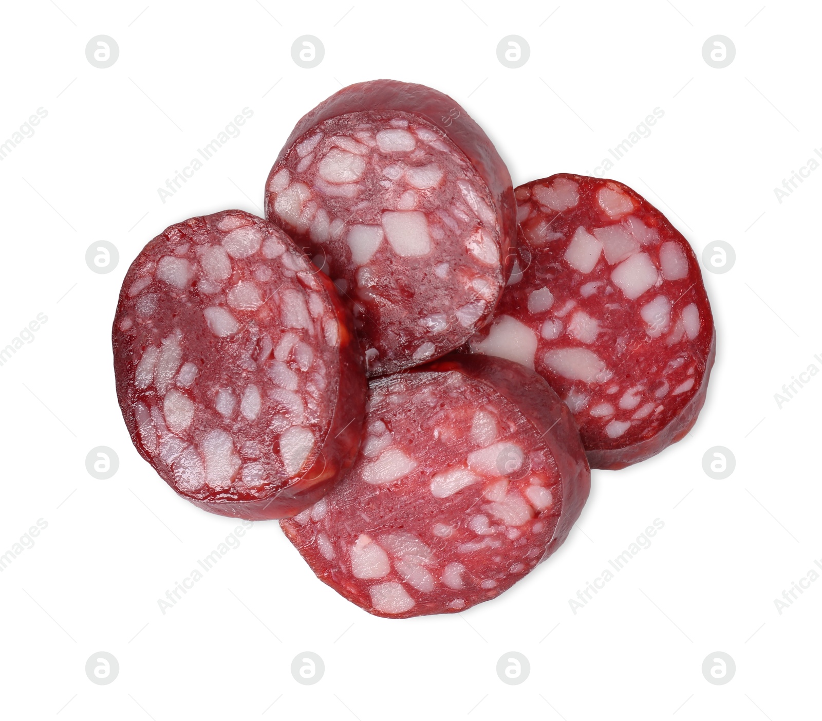 Photo of Pieces of delicious dry cured sausage isolated on white, top view