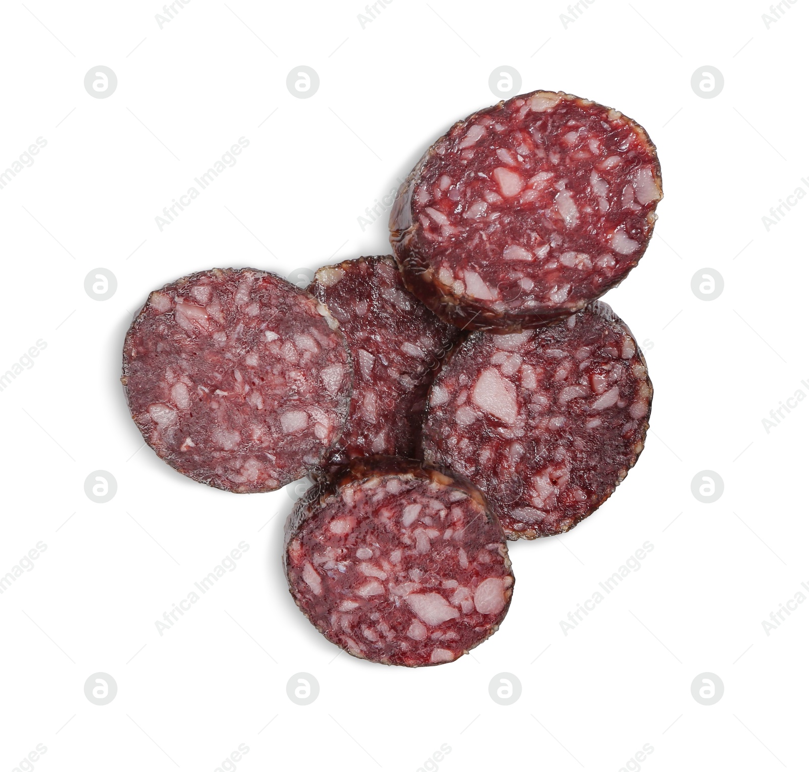 Photo of Pieces of delicious dry cured sausage isolated on white, top view