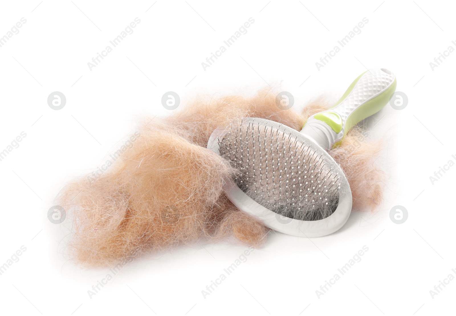 Photo of Grooming brush and pile of pet's hair isolated on white