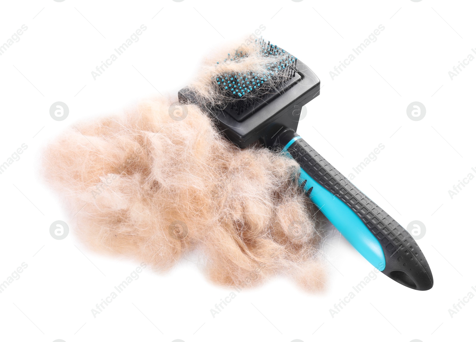 Photo of Grooming brush and pile of pet's hair isolated on white