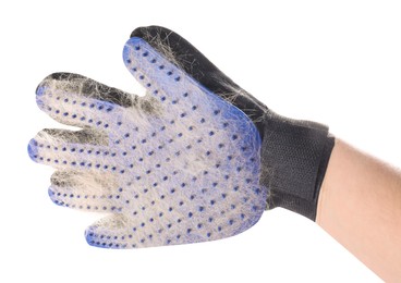 Photo of Woman wearing grooming glove with pet's hair on white background, closeup