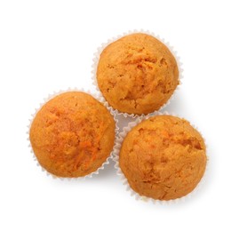 Photo of Tasty carrot muffins isolated on white, top view