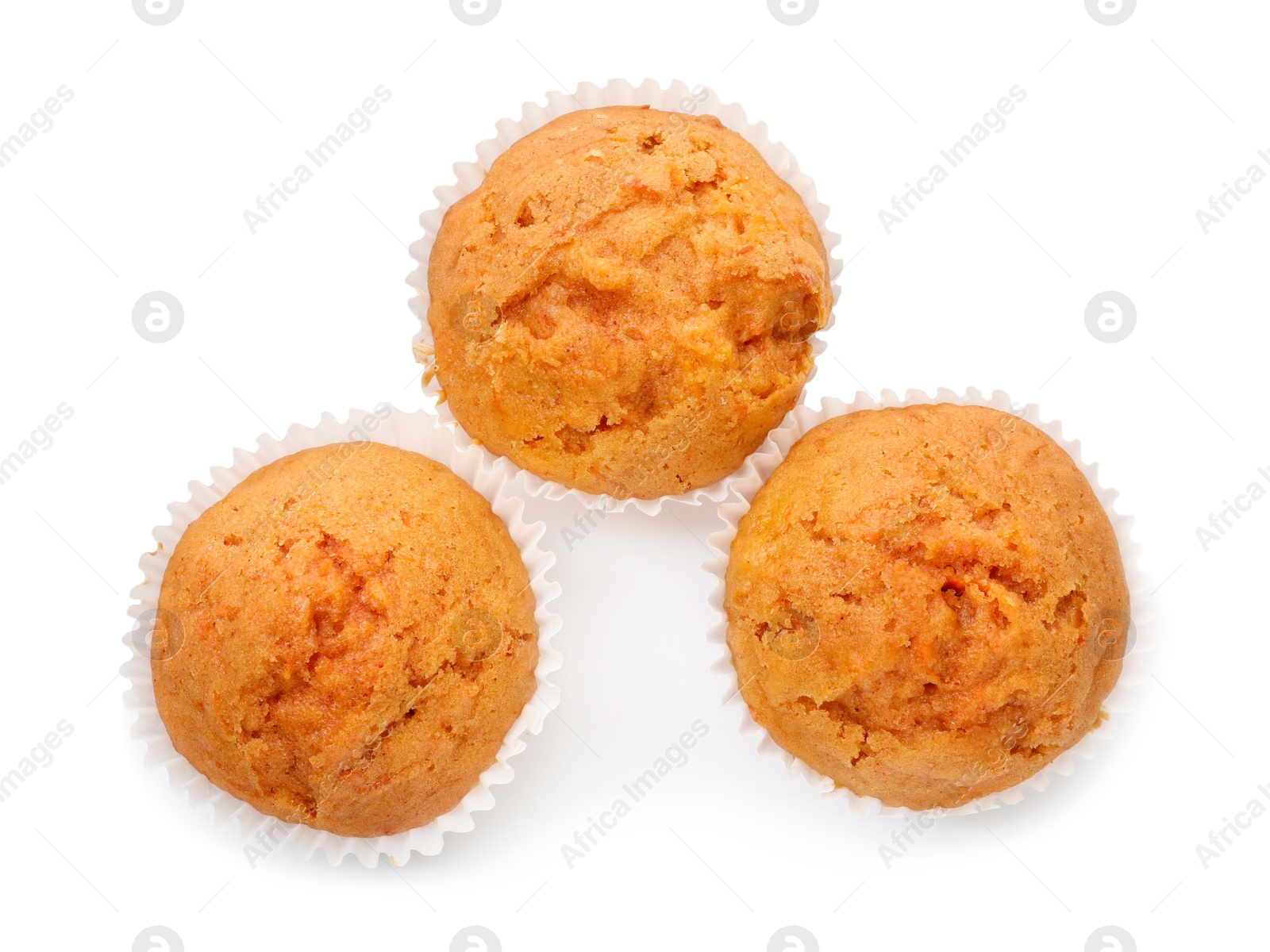 Photo of Tasty carrot muffins isolated on white, top view