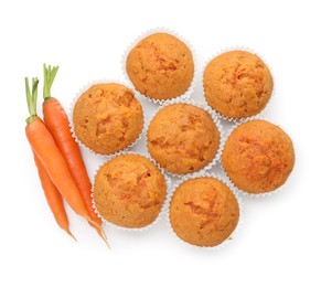 Photo of Tasty carrot muffins and fresh vegetables isolated on white, top view