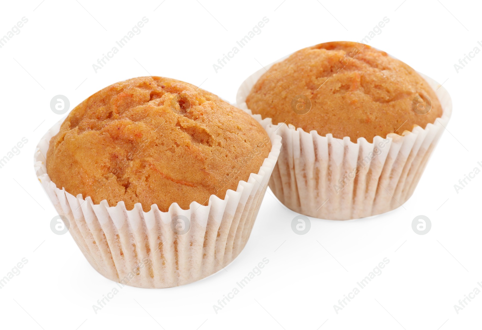 Photo of Tasty sweet carrot muffins isolated on white