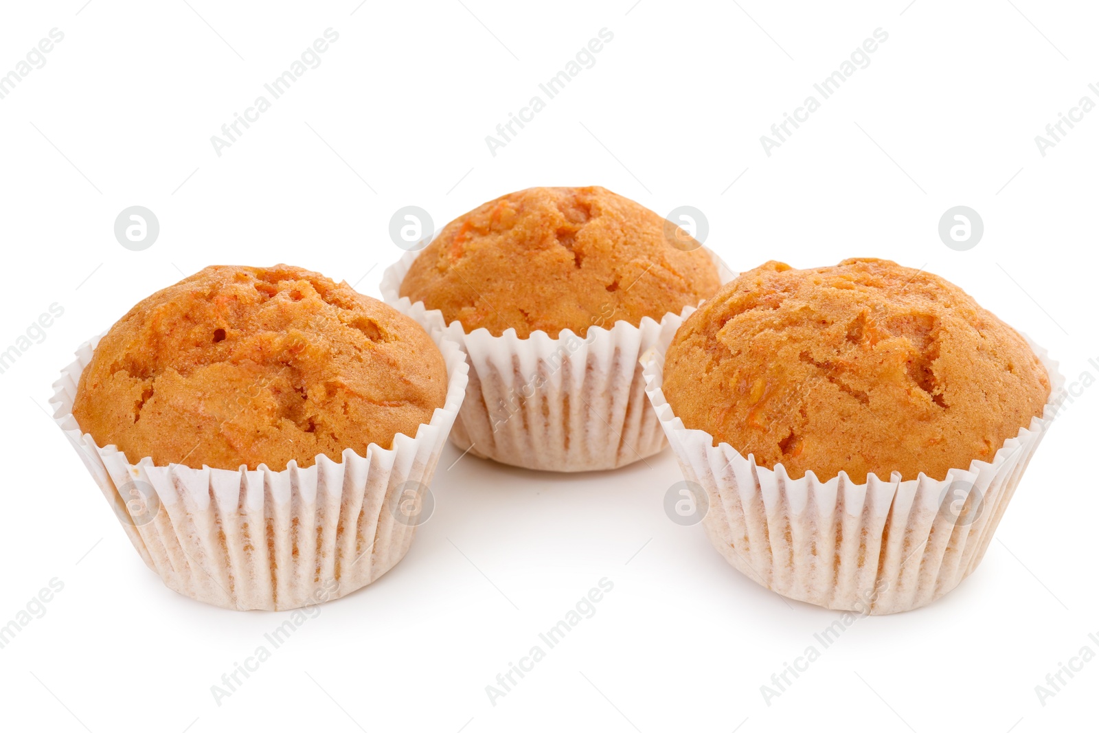 Photo of Tasty sweet carrot muffins isolated on white