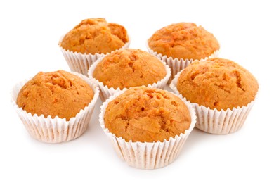 Photo of Tasty sweet carrot muffins isolated on white