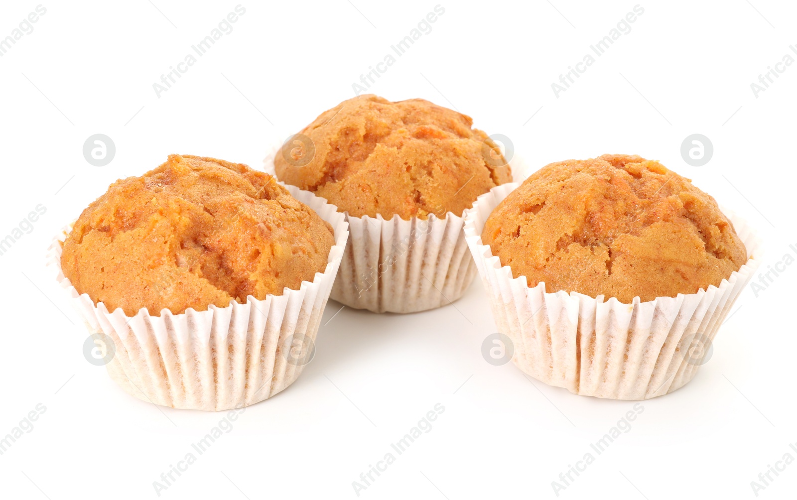 Photo of Tasty sweet carrot muffins isolated on white