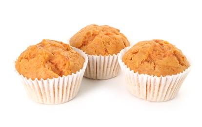 Photo of Tasty sweet carrot muffins isolated on white