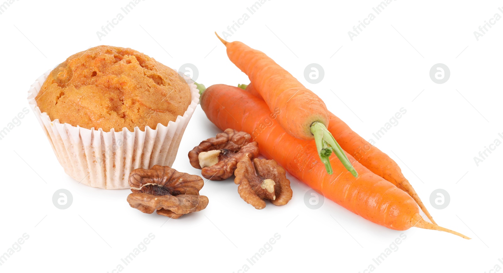 Photo of Tasty carrot muffin, walnuts and fresh vegetables isolated on white