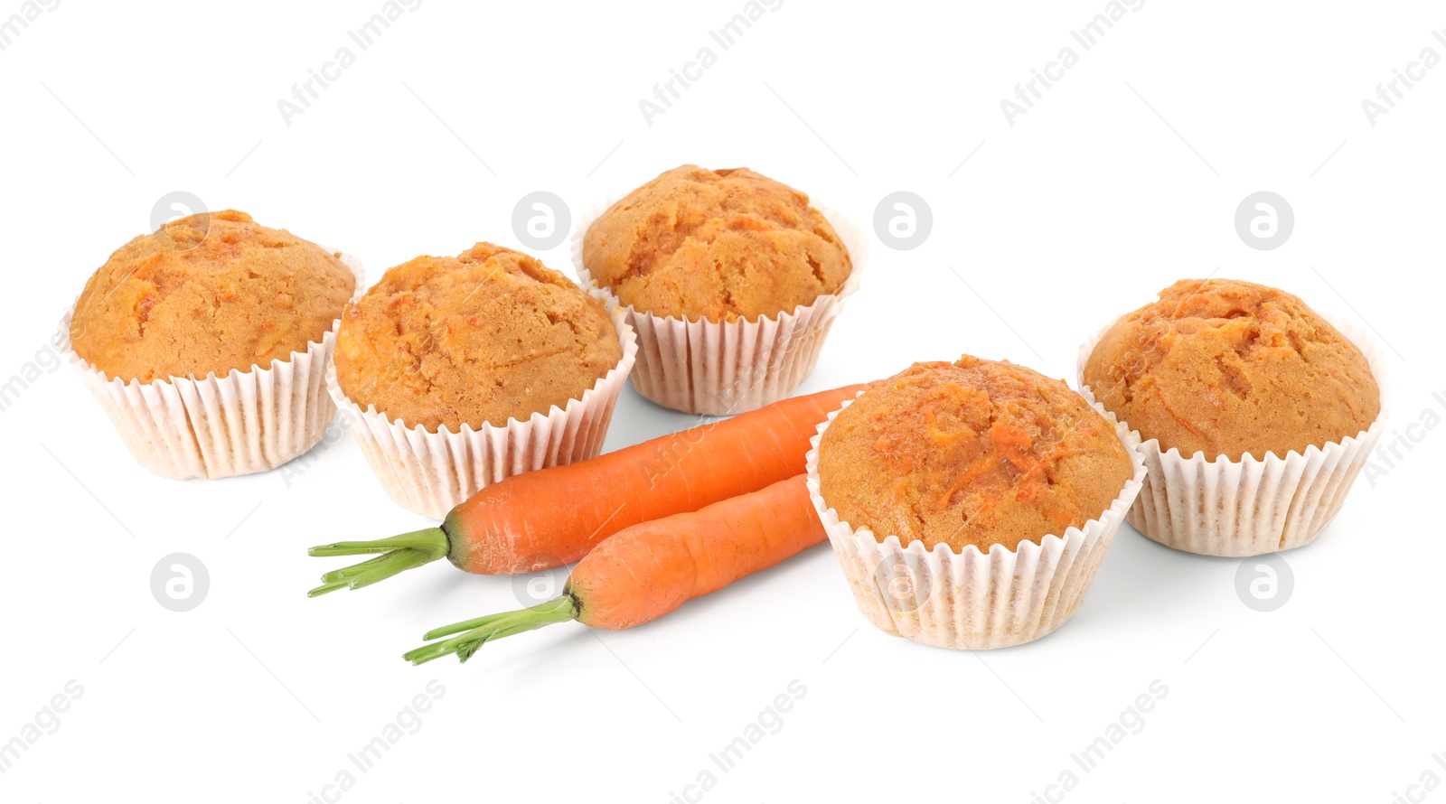 Photo of Tasty carrot muffins and fresh vegetables isolated on white