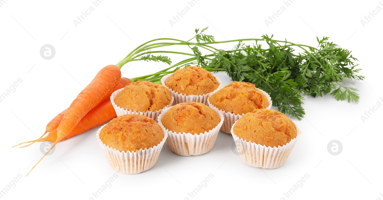 Photo of Tasty carrot muffins and fresh vegetables isolated on white