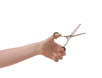 Photo of Woman with scissors for pet grooming on white background, closeup