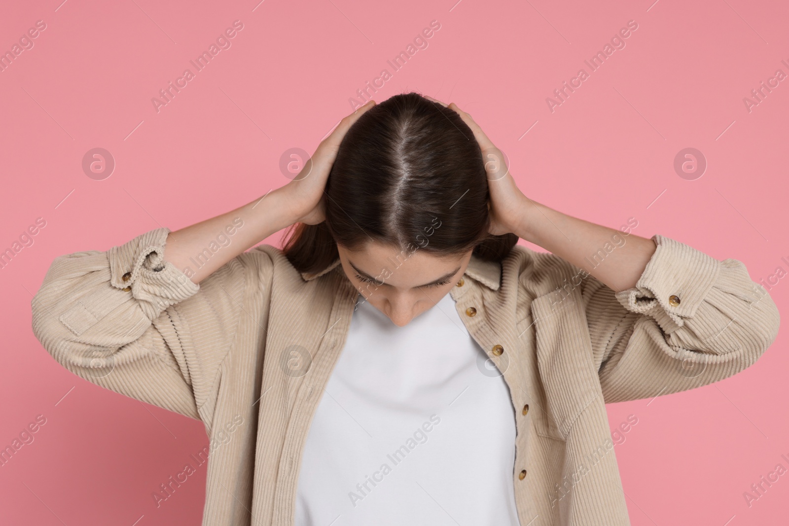 Photo of Girl with hair loss problem on pink background