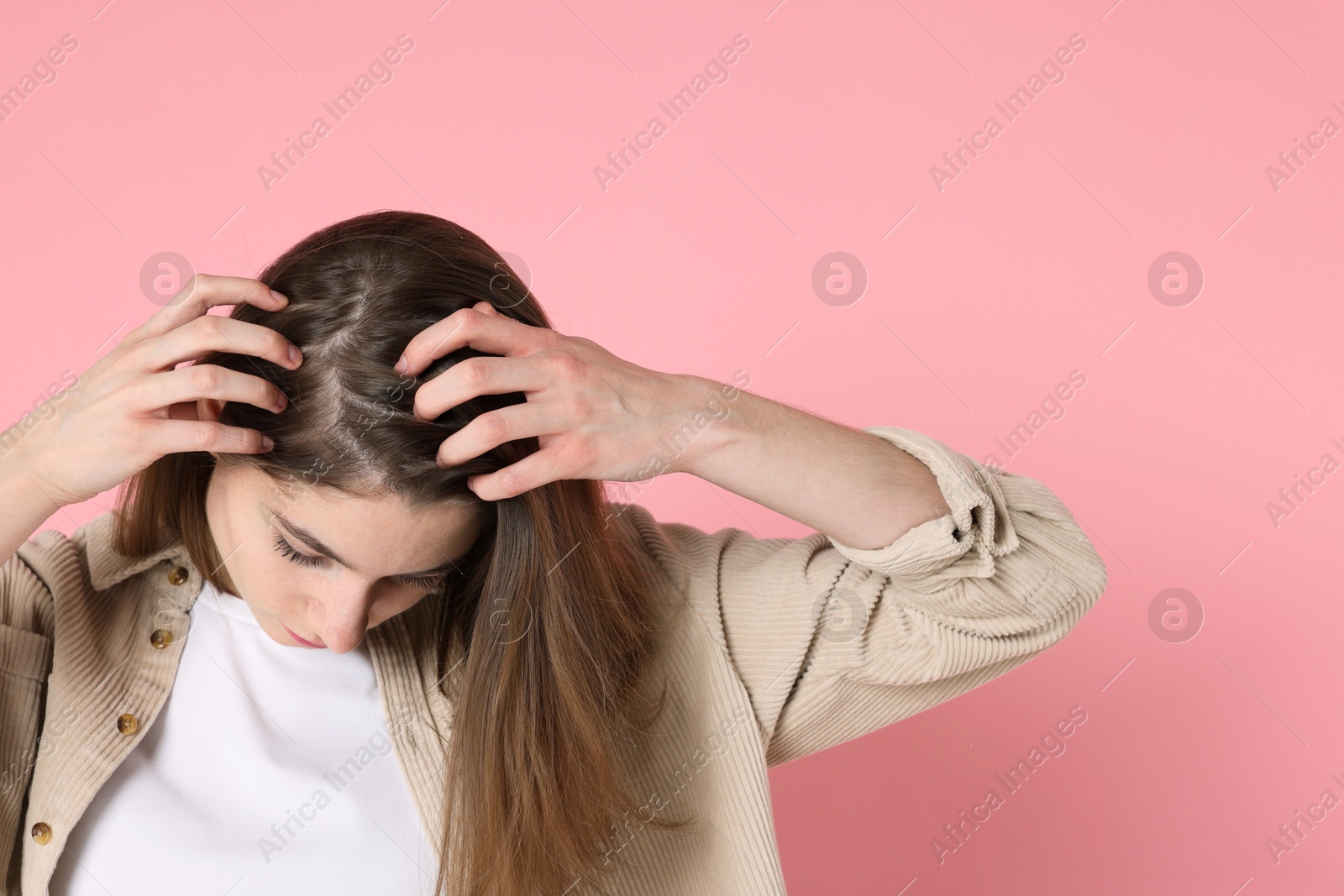 Photo of Girl with hair loss problem on pink background