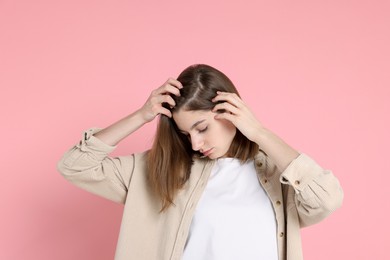 Photo of Girl with hair loss problem on pink background