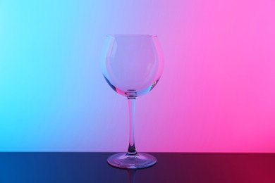 Photo of Empty glass on table, color tone effect