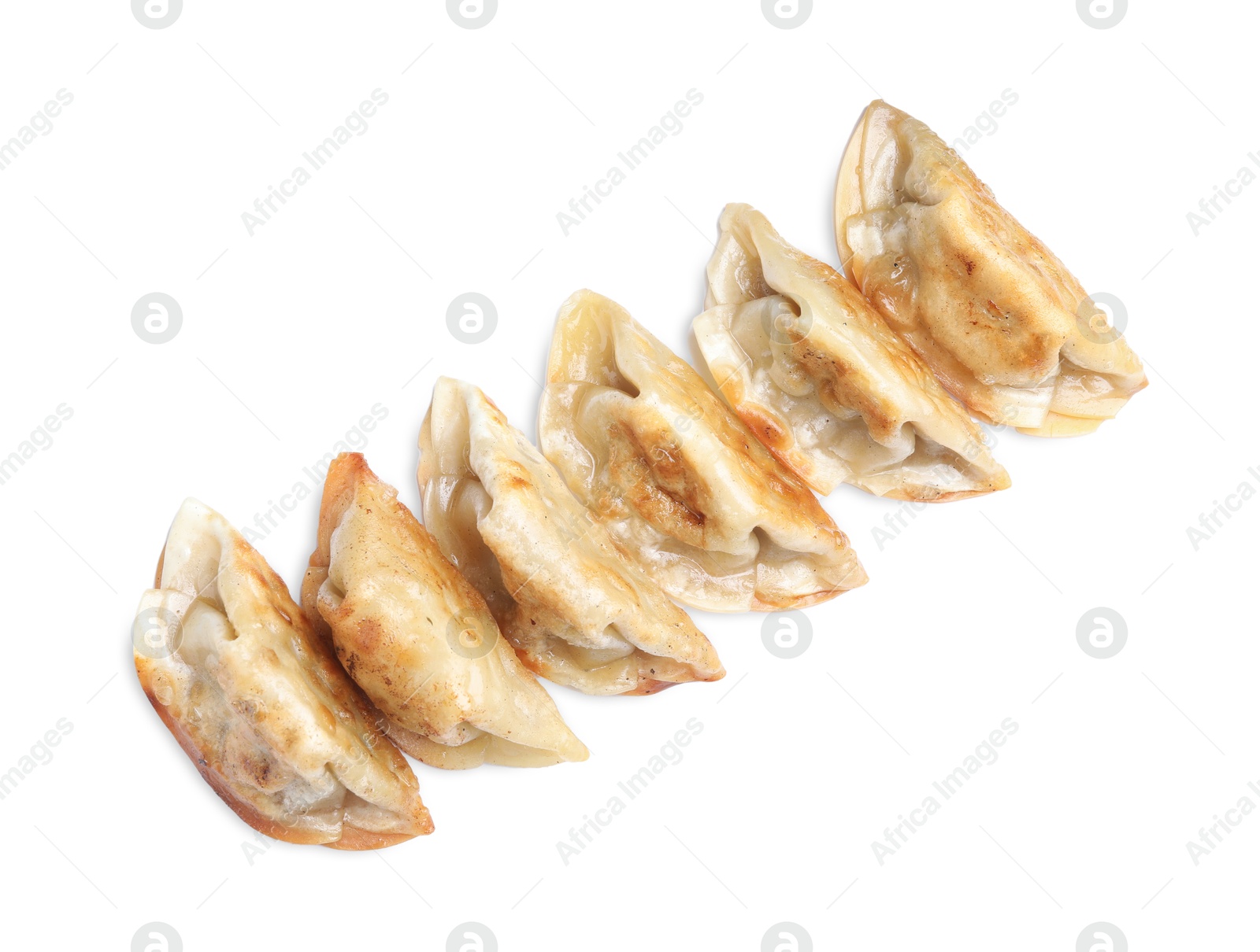 Photo of Delicious fried gyoza dumplings isolated on white, top view