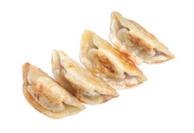 Delicious fried gyoza dumplings isolated on white, top view