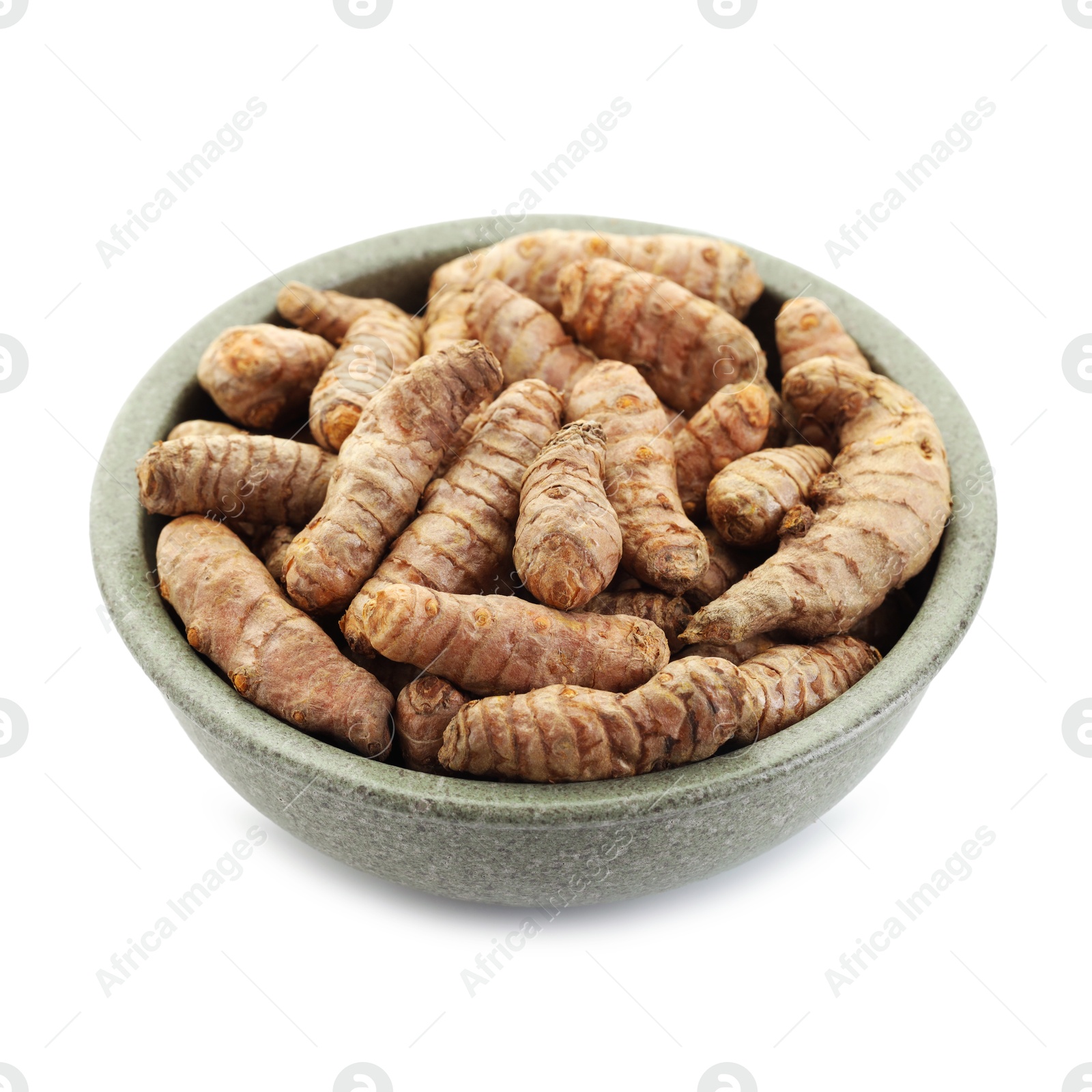 Photo of Tumeric rhizomes in bowl isolated on white