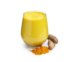 Photo of Delicious turmeric latte in glass, powder and roots isolated on white