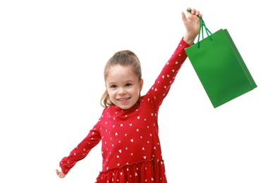 Happy little girl with shopping bag on white background