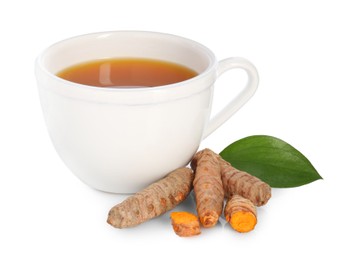 Photo of Aromatic turmeric tea in cup, roots and green leaf isolated on white