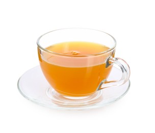 Photo of Aromatic turmeric tea in glass cup isolated on white