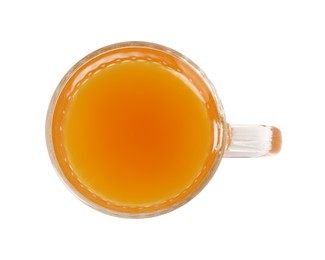 Photo of Aromatic turmeric tea in glass cup isolated on white, top view