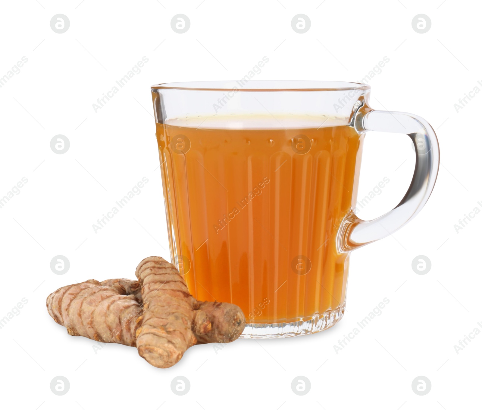 Photo of Aromatic turmeric tea in glass cup and roots isolated on white