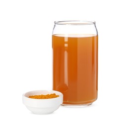 Photo of Aromatic turmeric tea in glass and powder isolated on white