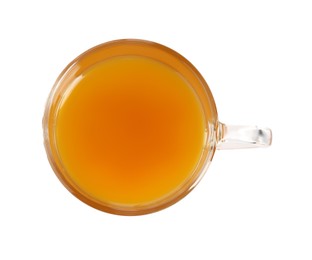 Photo of Aromatic turmeric tea in glass cup isolated on white, top view